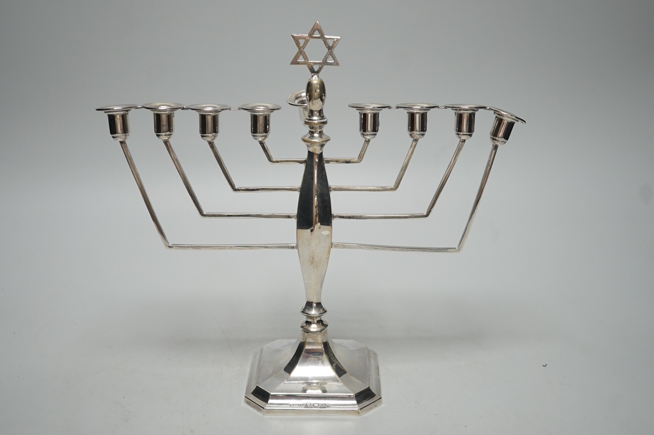 A George V silver Hanukah Menorah, Britton, Gould & Co, Birmingham, 1937, height 23.cm, 7.7oz.